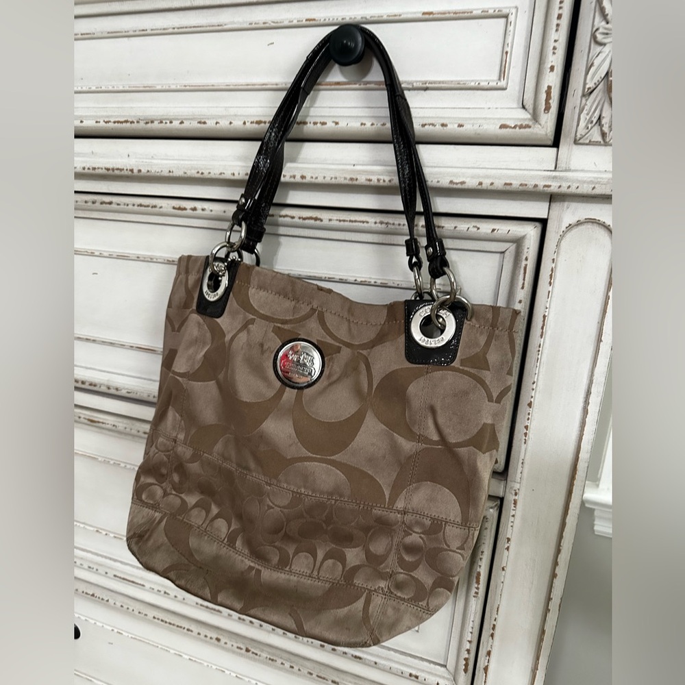 Tan Coach purse